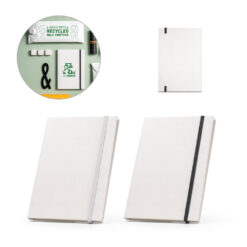aderno A5 produzido através de pacotes de leite reciclados com folhas pautadas recicladas